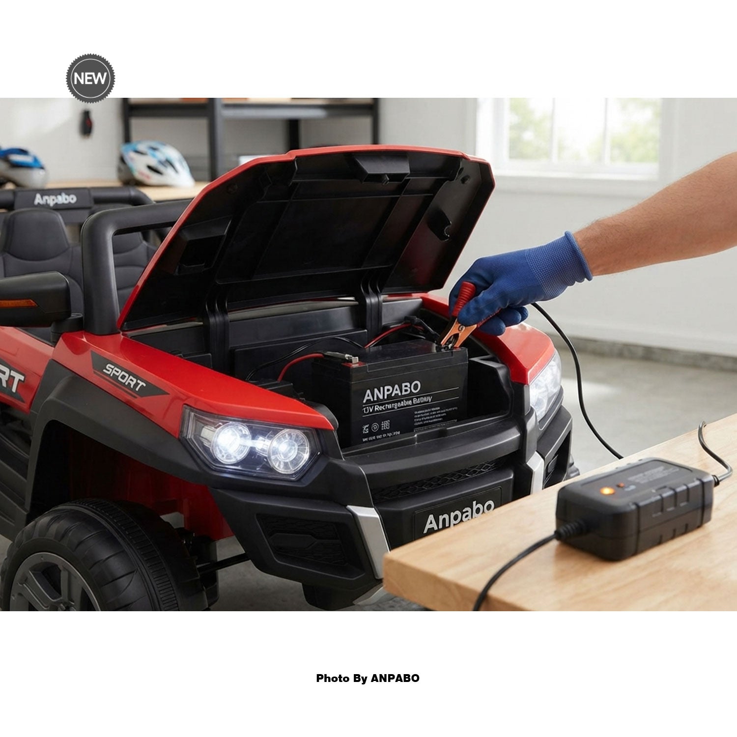 Maintenance step: connecting a charger to an Anpabo ride-on car battery.